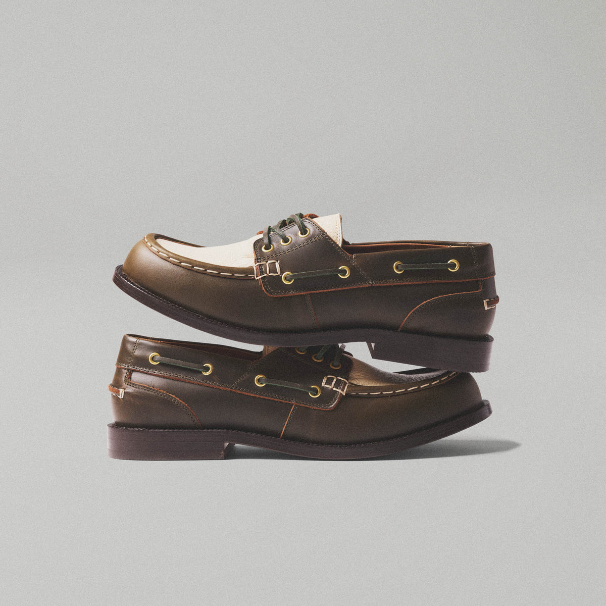 Two-tone khaki and cream leather boat shoe