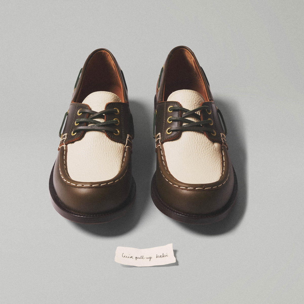 Two-tone khaki and cream leather boat shoe