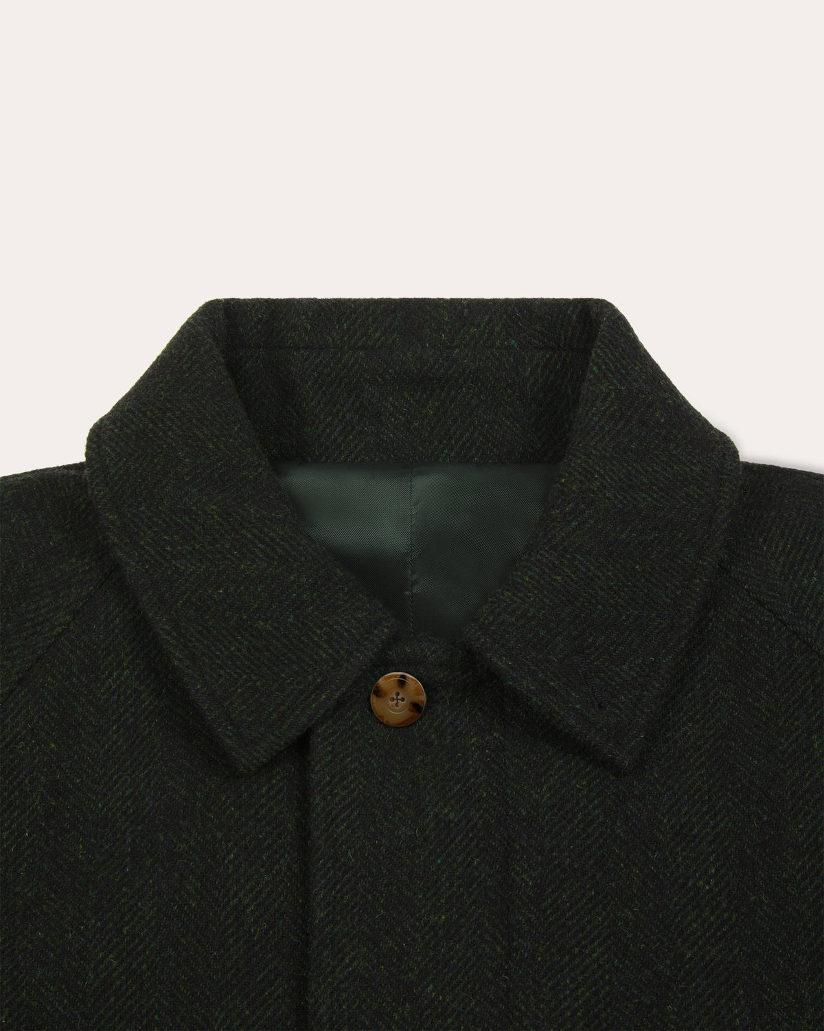 Balmacaan coat in green virgin wool herringbone