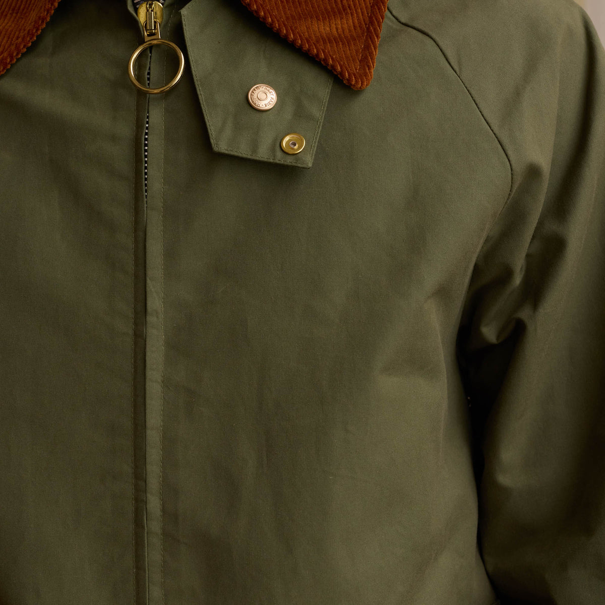 Grüne Blousonjacke aus gewachster baumwolle