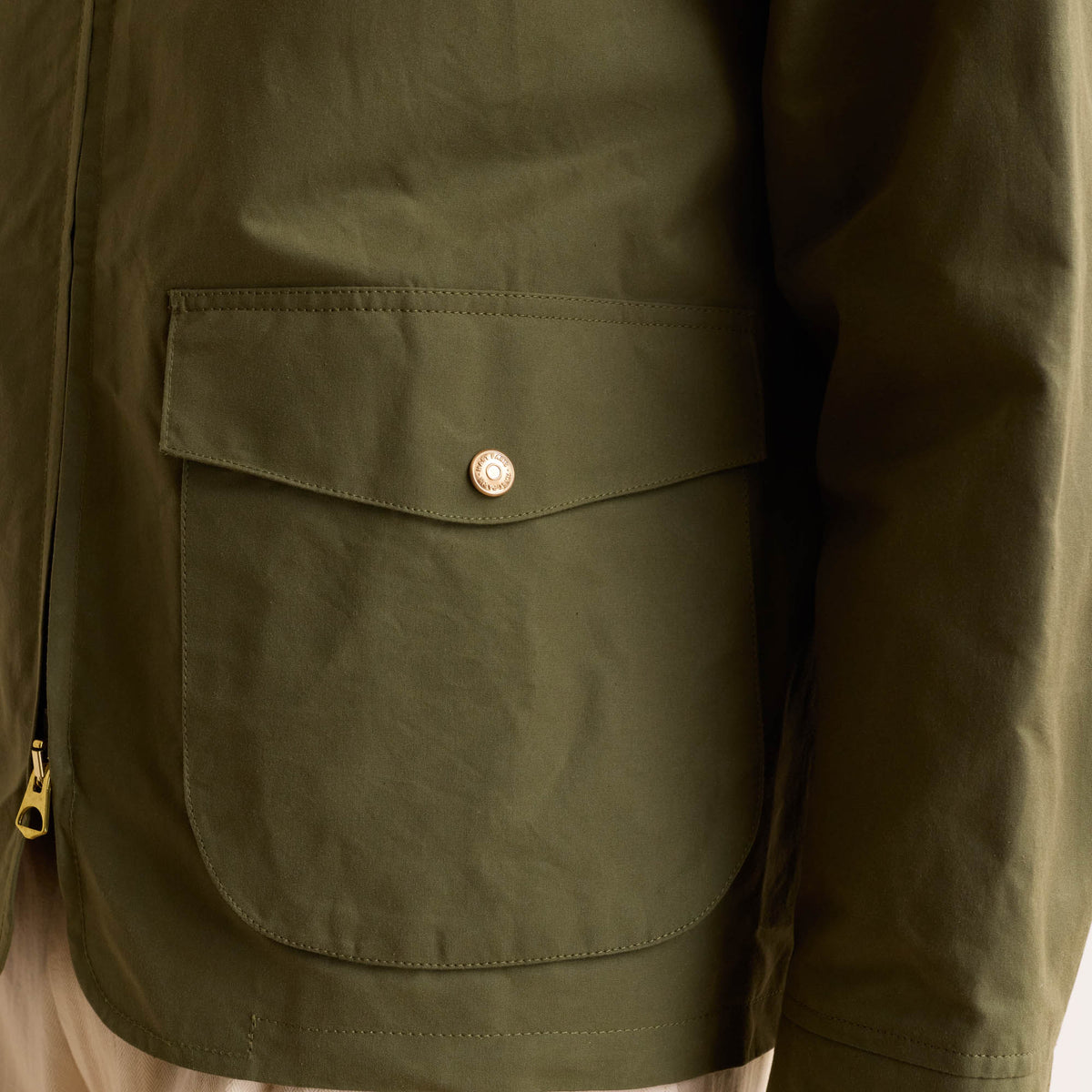 Grüne Blousonjacke aus gewachster baumwolle