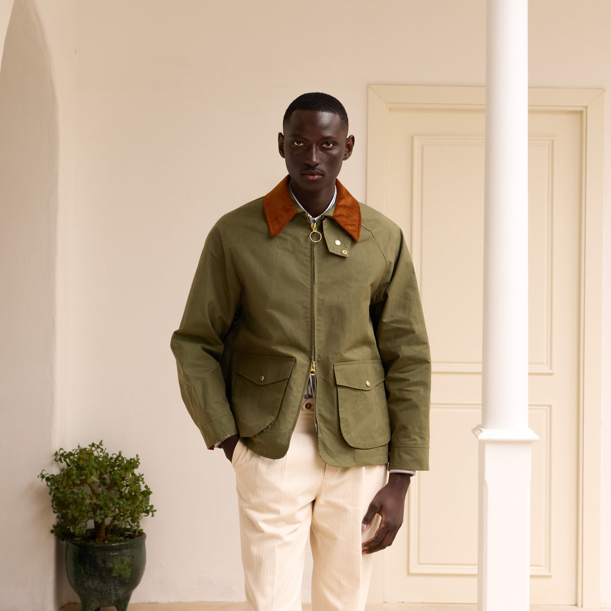 Grüne Blousonjacke aus gewachster baumwolle