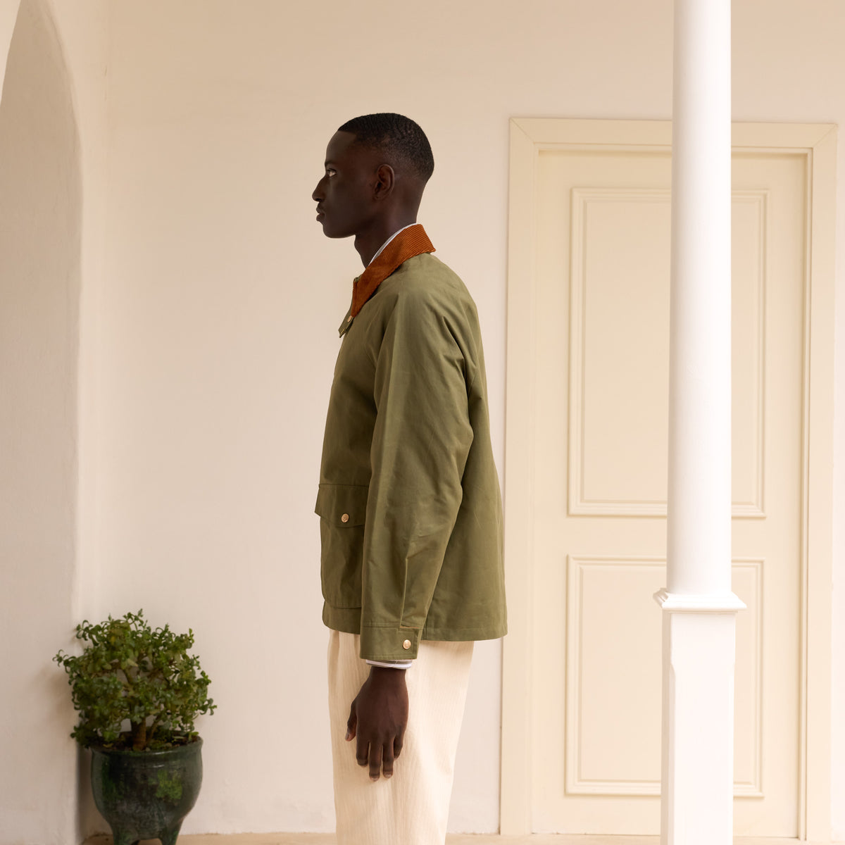 Grüne Blousonjacke aus gewachster baumwolle