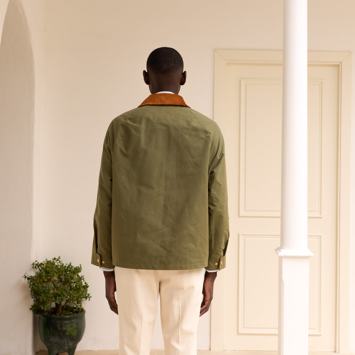Grüne Blousonjacke aus gewachster baumwolle