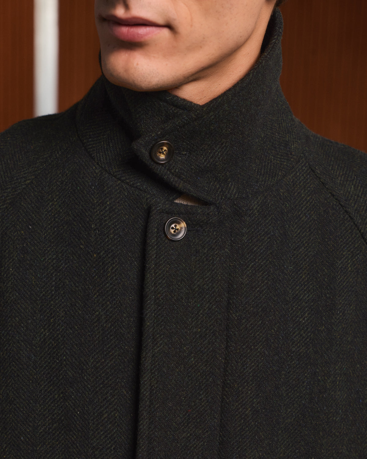 Balmacaan coat in green virgin wool herringbone