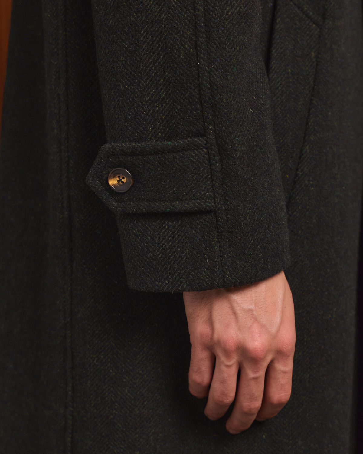 Balmacaan coat in green virgin wool herringbone