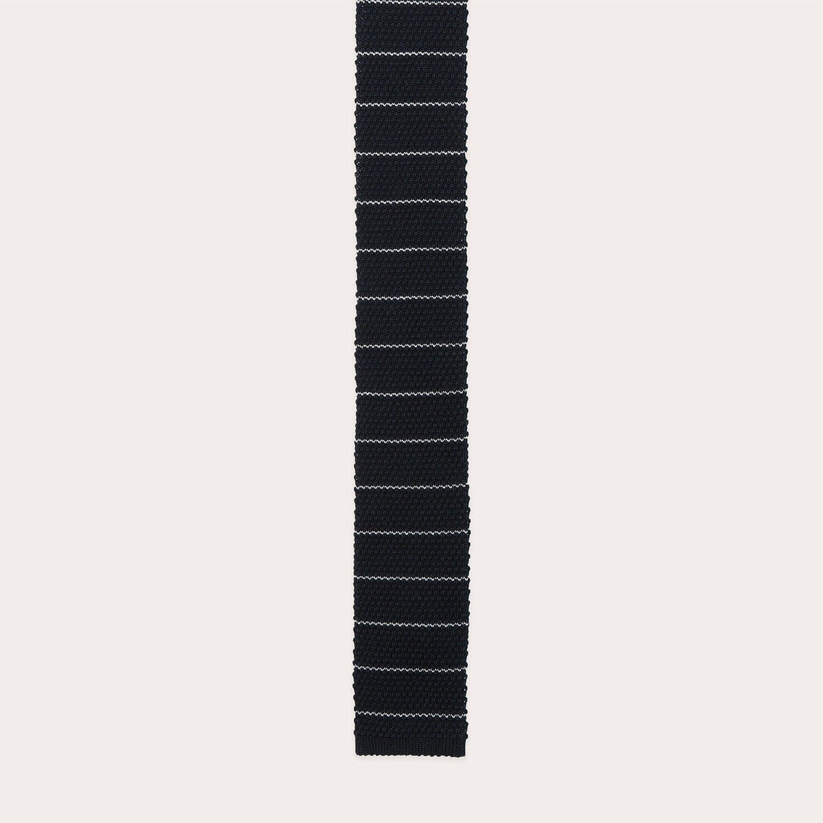 Navy knitted tie with white stripes
